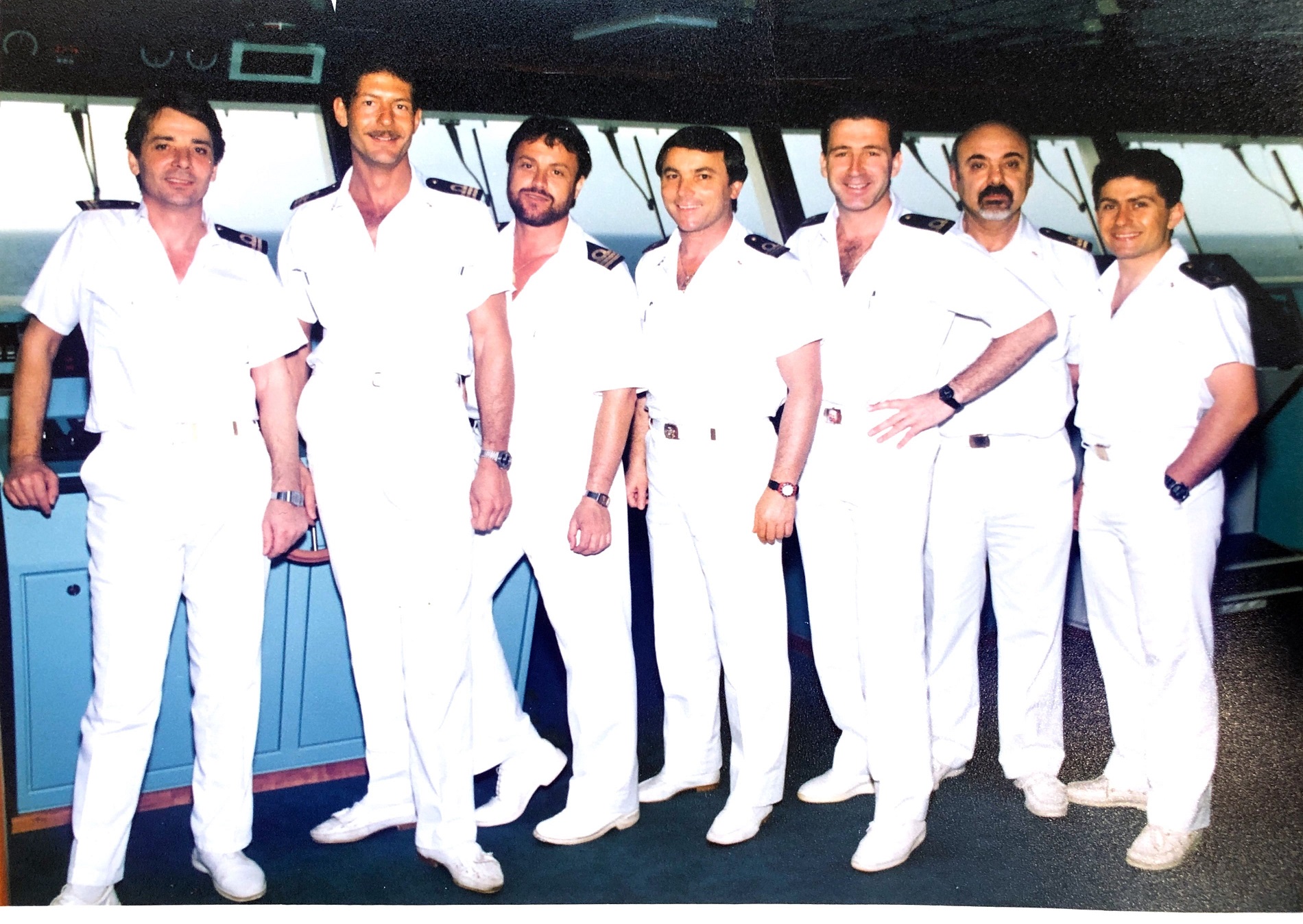 Carnival Fantasy’s officers, including eventual Captains Alessandro Galotto (second from left) and Gaetano Gigliotti (third from right) are shown here on the ship’s navigational bridge during start-up.
