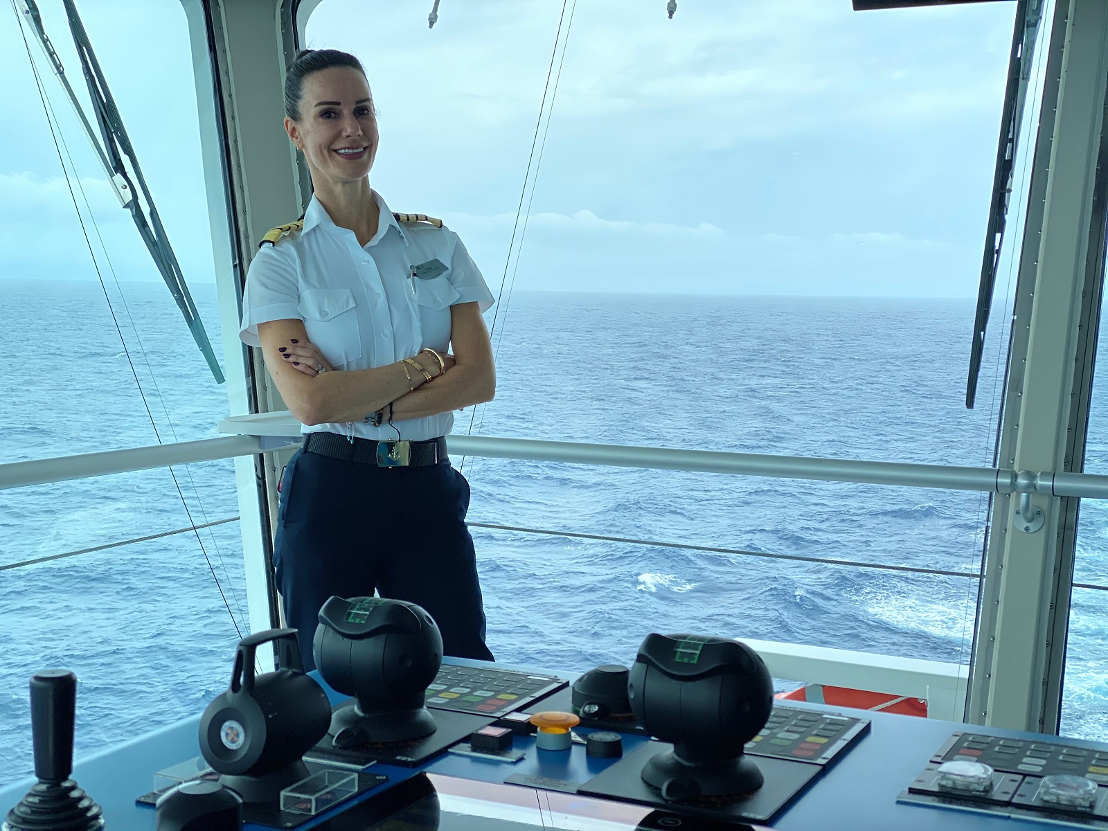 Captain Kate at the helm of Celebrity Edge's International Women's Day sailing, March 2020 (Photo by Ashley Kosciolek)