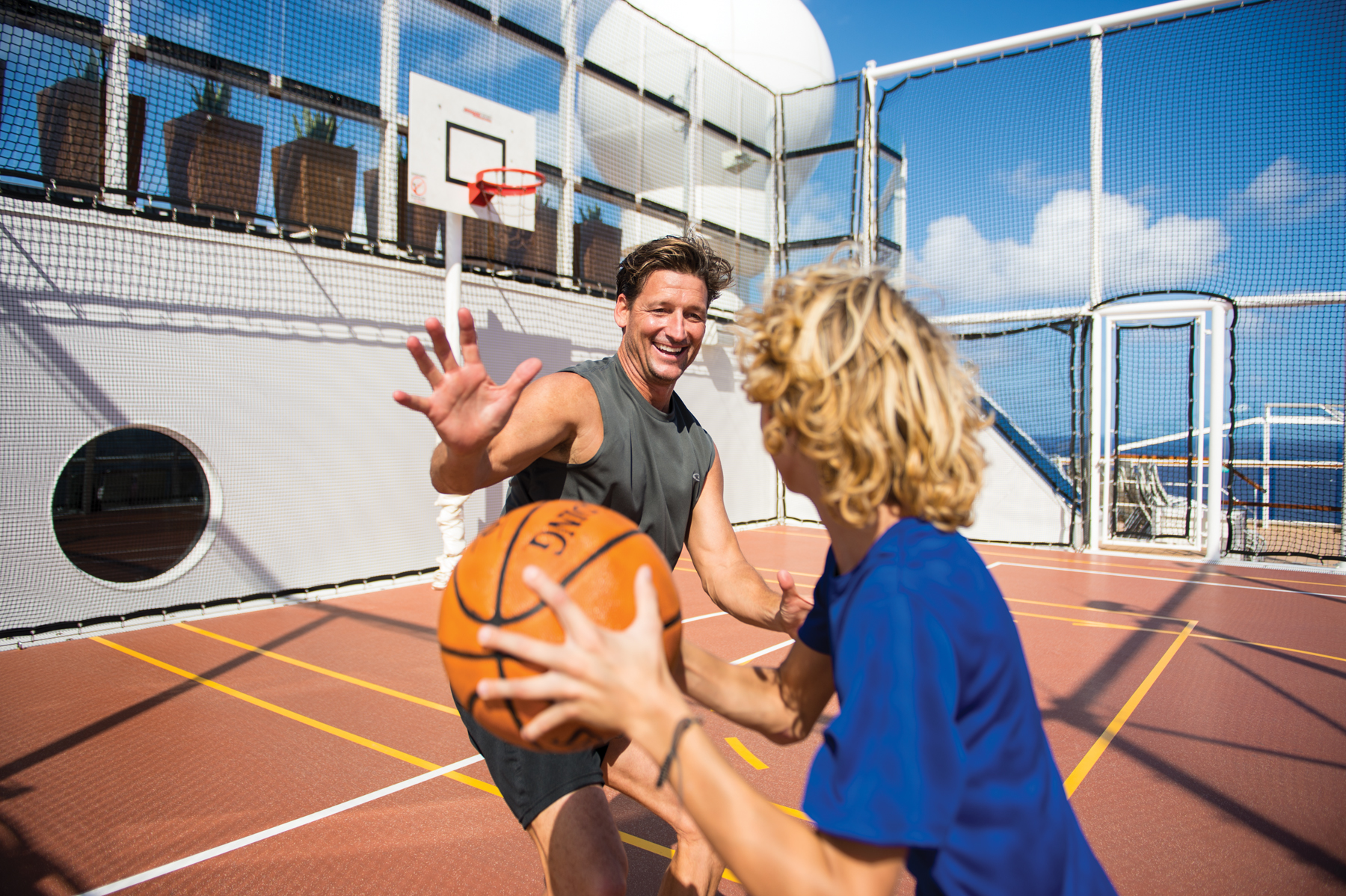 A couple playing basketball on a Celebrity cruise ship (source: Celebrity Cruises)