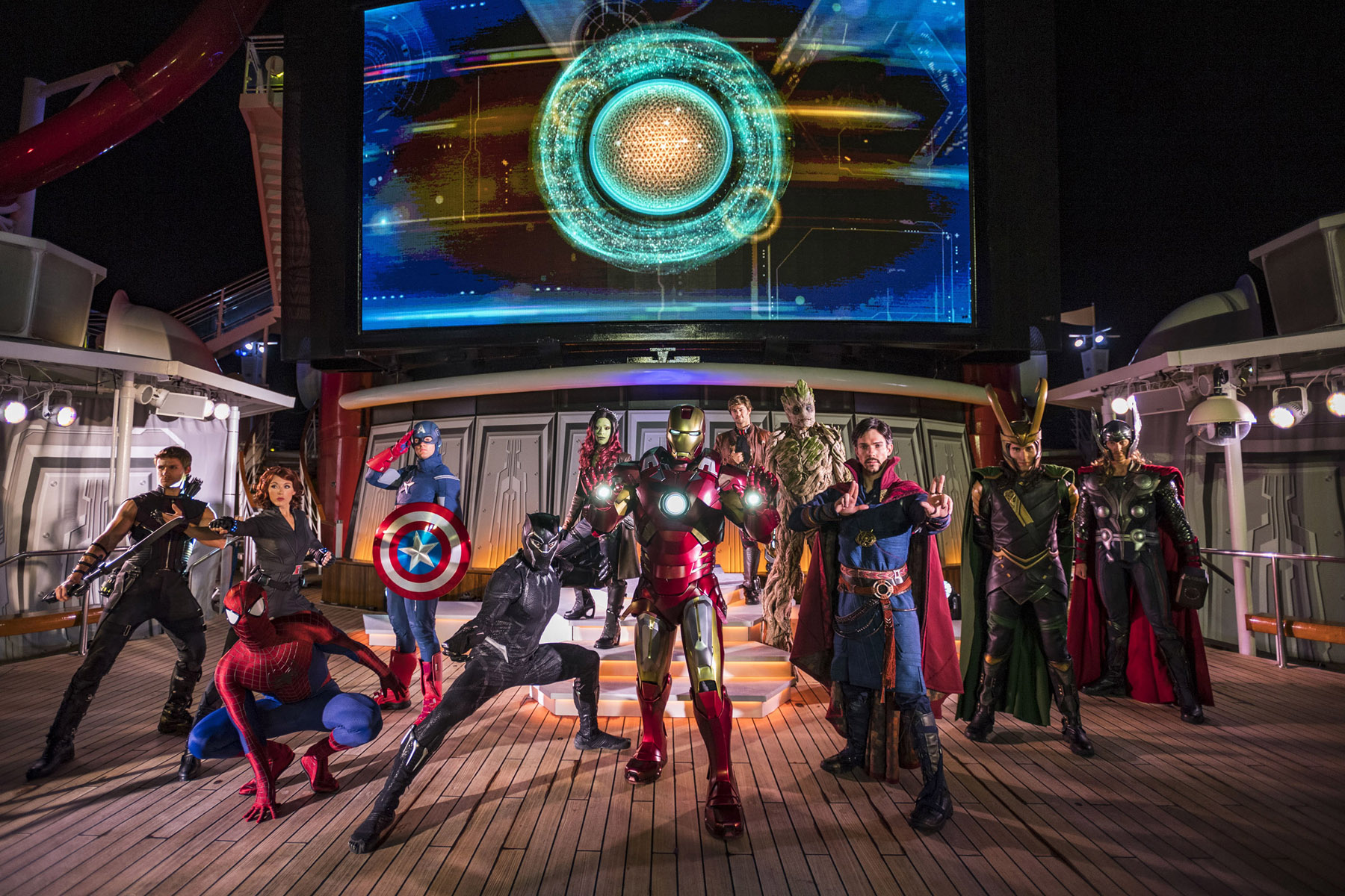 Characters from Disney Cruise Line's Marvel Avengers Academy posing on the pool deck (source: Disney Cruise Line)