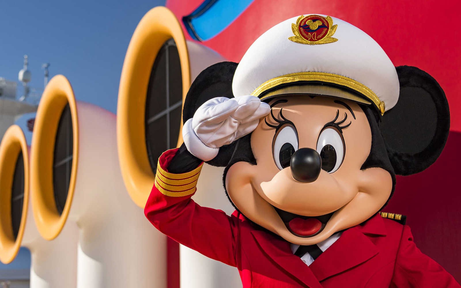 Captain Minnie salutes by the funnel of a Disney Cruise Line ship (source: Disney Cruise Line)