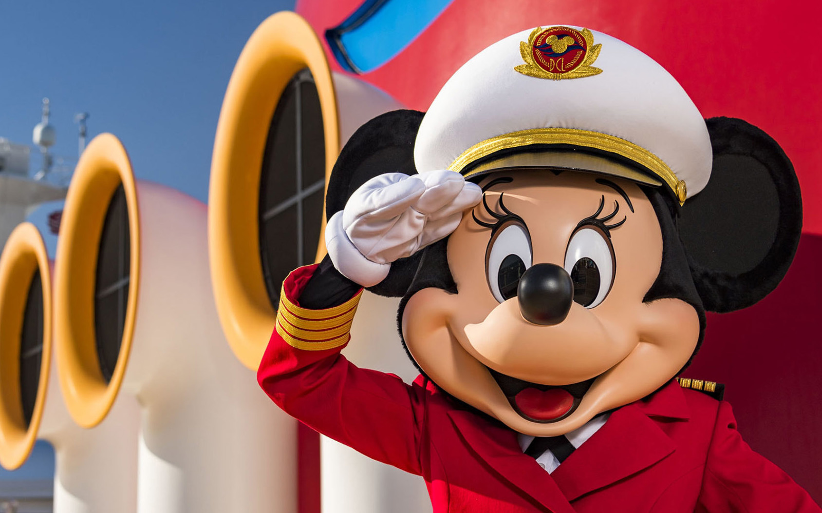 Captain Minnie saluting in front of funnel on Disney Cruise Line ship (source: Disney Cruise Line)