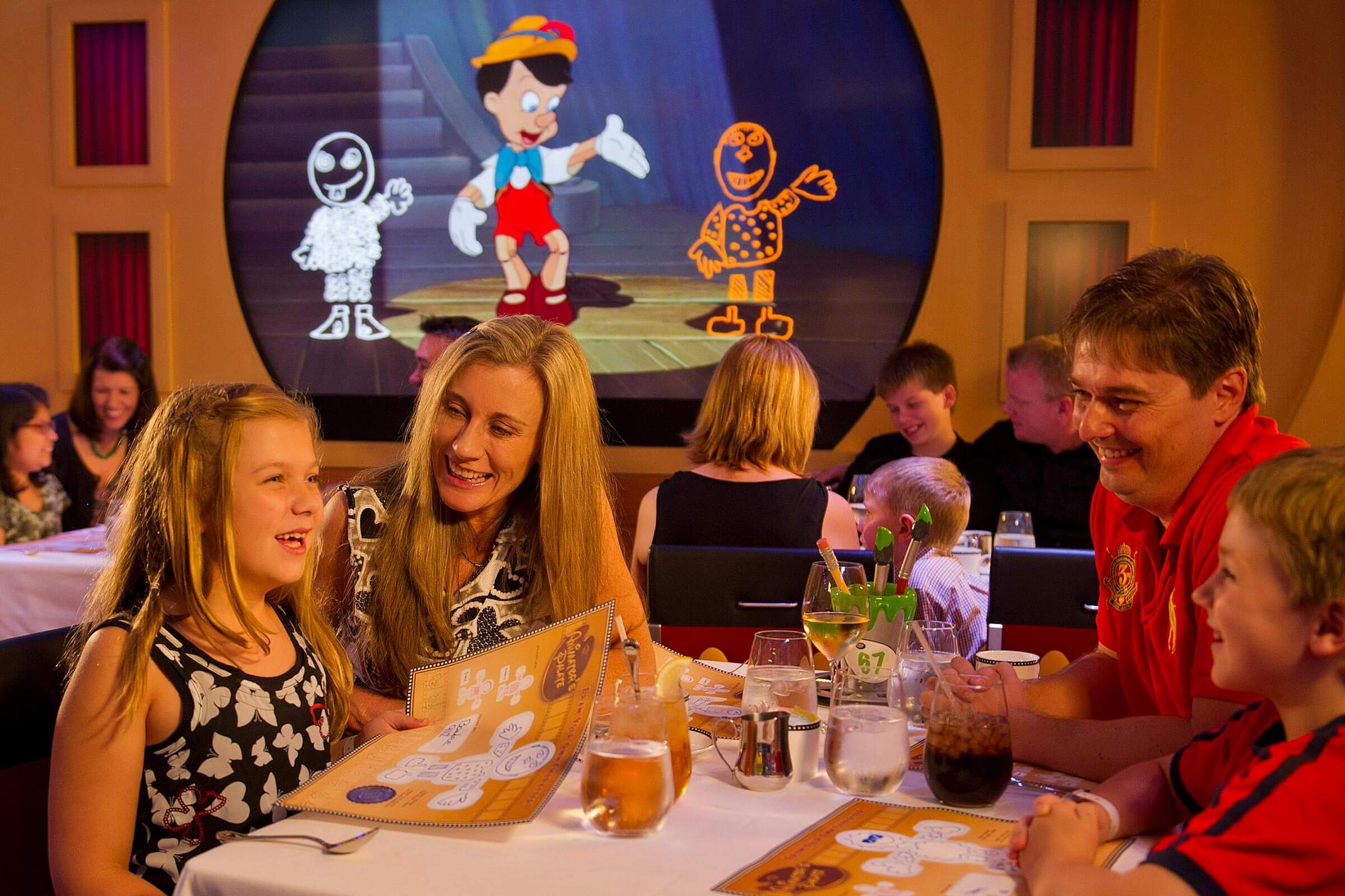 Family in dining room on Disney cruise