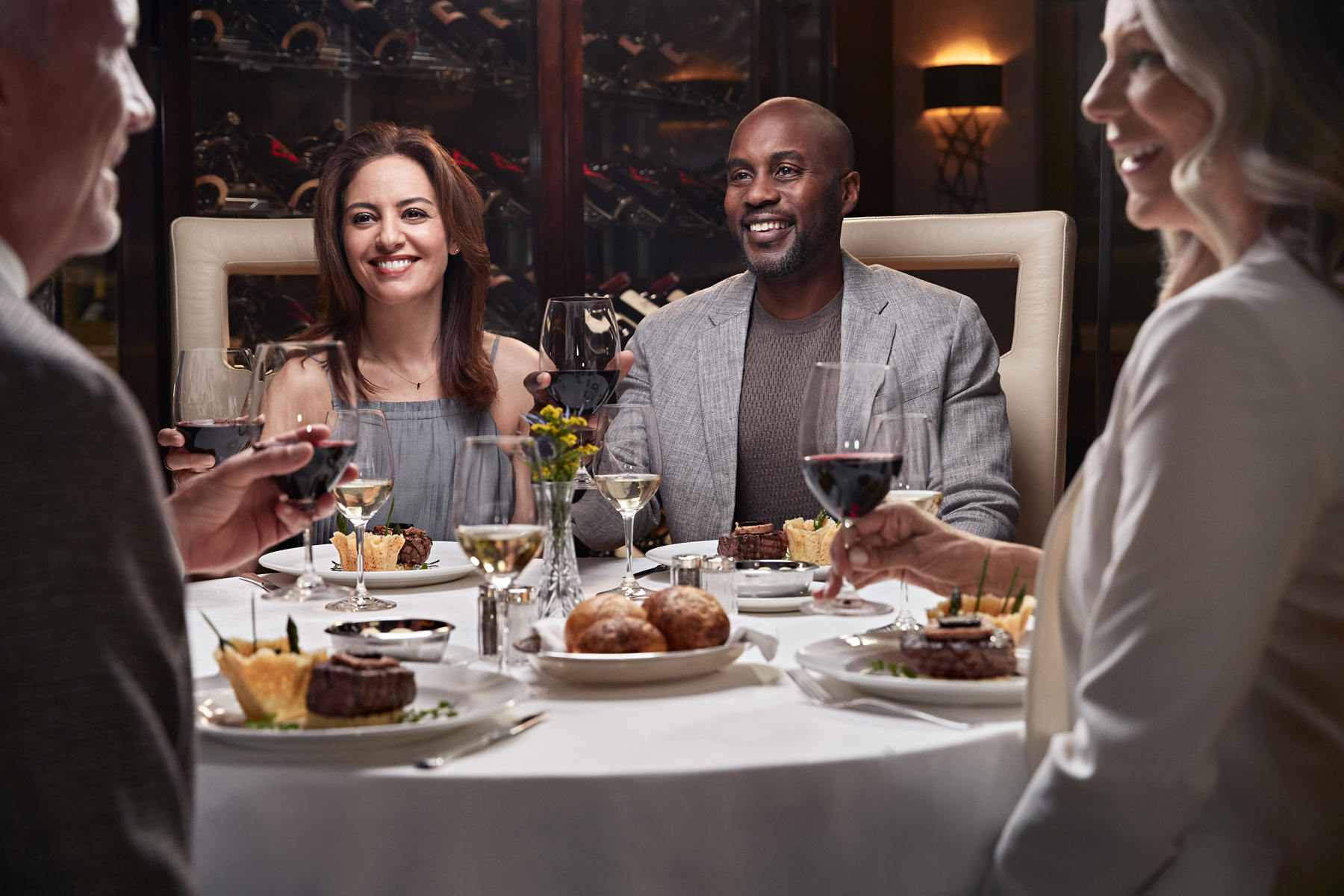 A group eating in the Concerto dining room on Grand Princess (source: Princess Cruises)