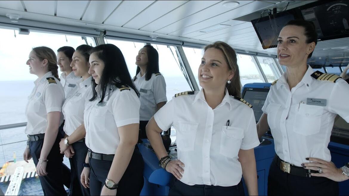 Captain Kate with crew members on the bridge