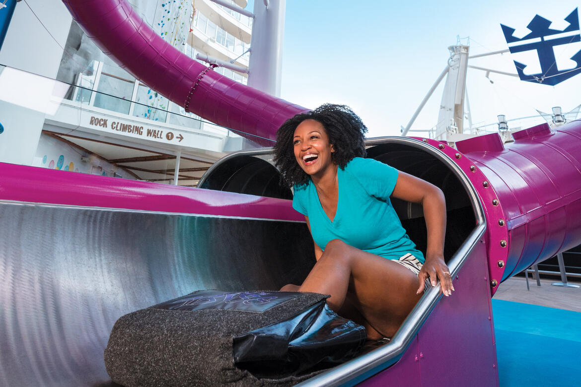 Woman on Ultimate Abyss slide