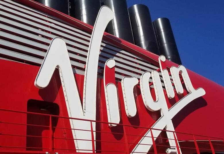 Virgin Voyages logo on ship