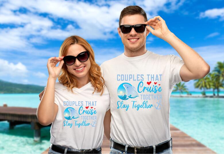 couple wearing a matching cruise t-shirt while on the beach