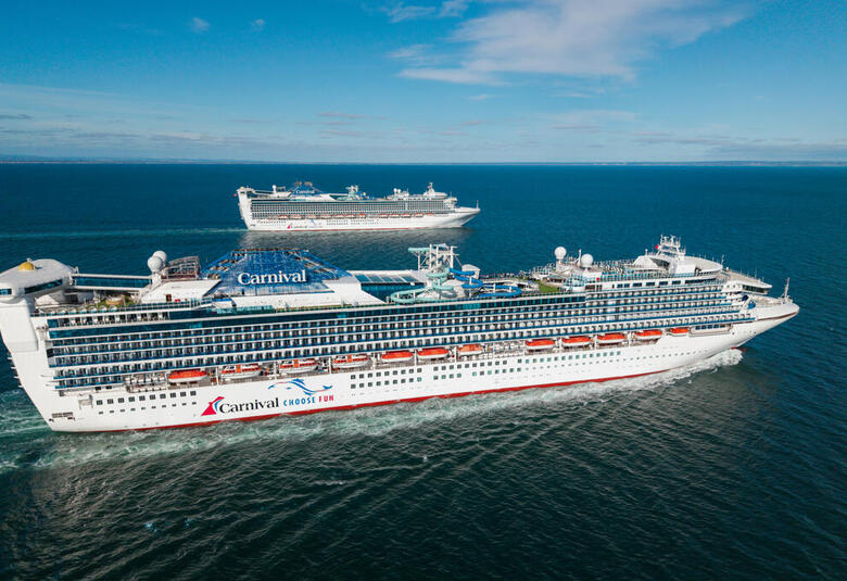 Carnival Adventure and Carnival Encounter sail side by side