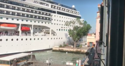 Huge cruise ship plows into dock in Venice