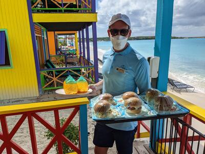 Butler with sandwiches in villa