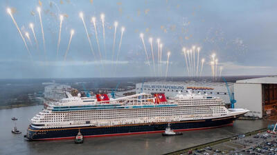 Disney Wish at the shipyard with fireworks