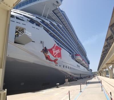 Virgin Voyages ship docked