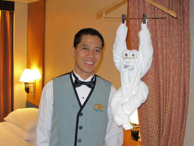 Cruise ship staff member and towel animal