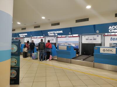 Check-in desk at Naples cruise port