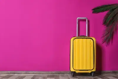 yellow-suitcase-stock