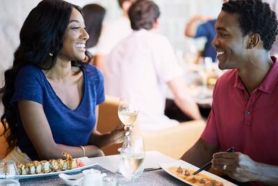 Couple enjoying a meal on Celebrity Cruises