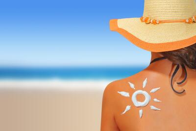 sunbathing-woman-sunscreen