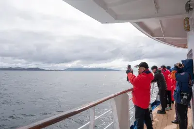 people taking pictures of cape horn chile
