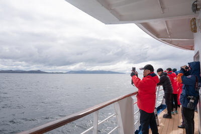 people taking pictures of cape horn chile