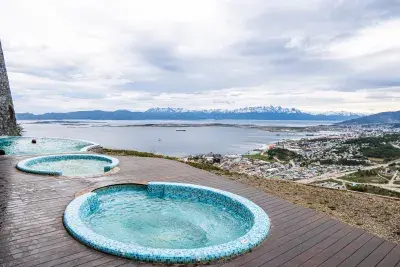 Three jacuzzis on an outdoor patio