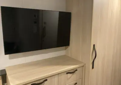 TV and dresser inside cabin
