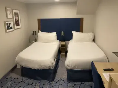 Two beds in an inside cabin