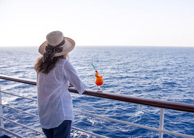 Girl-with-cocktail-on-ship