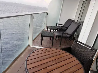 Suite balcony with many chairs
