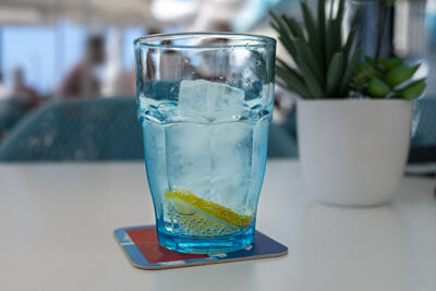 glass of water with ice and lemon