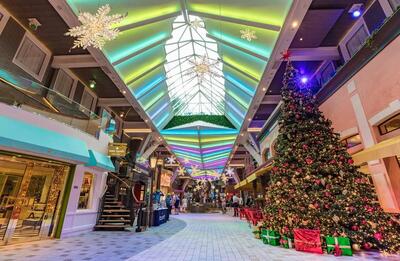 The Royal Promenade on an Oasis Class ship decorated for Christmas