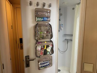 Handing toiletry organizer on Vision of the Seas