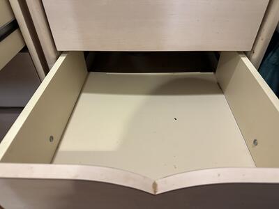 Nightstand on Vision of the Seas with a missing back panel