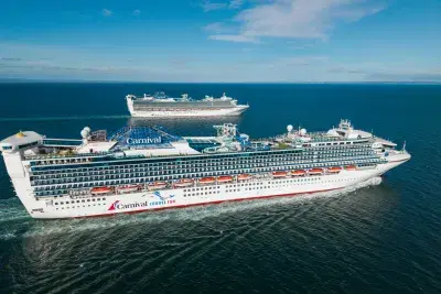 Carnival Adventure and Carnival Encounter sail side by side