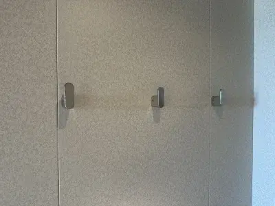 Metal hooks on the wall of a cruise ship cabin