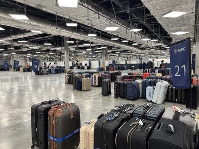 Numbered sections of luggage in a cruise ship terminal