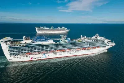 Carnival Adventure and Carnival Encounter sail side by side