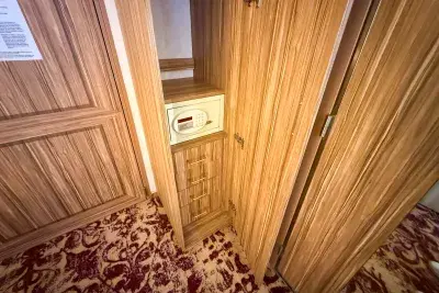 closet on Carnival Firenze cruise ship interior cabin