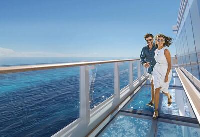 Couple strolling on deck of NCL