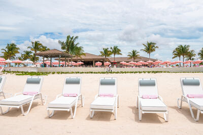 Pearl Cove beach club chairs on the beach