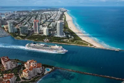 NCL Gem sailing away in Miami