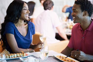 Couple enjoying a meal on Celebrity Cruises