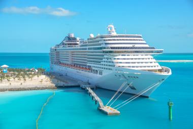 MSC Divina docked at private island