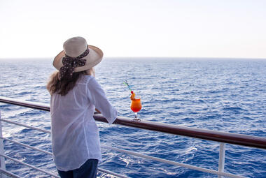 Girl-with-cocktail-on-ship