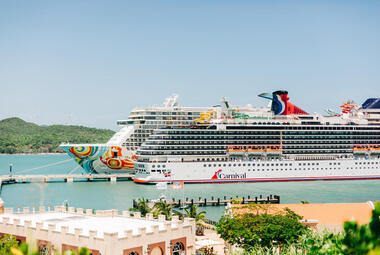 NCL and Carnival ship docked together